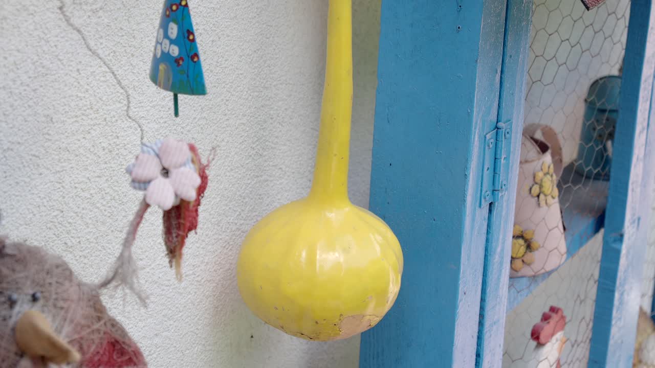 Decorative Gourds and Crafts on a Wall