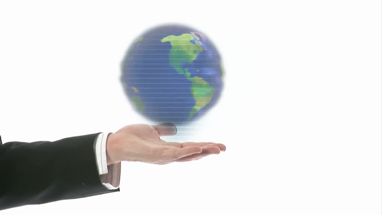 mano con un globo giratorio