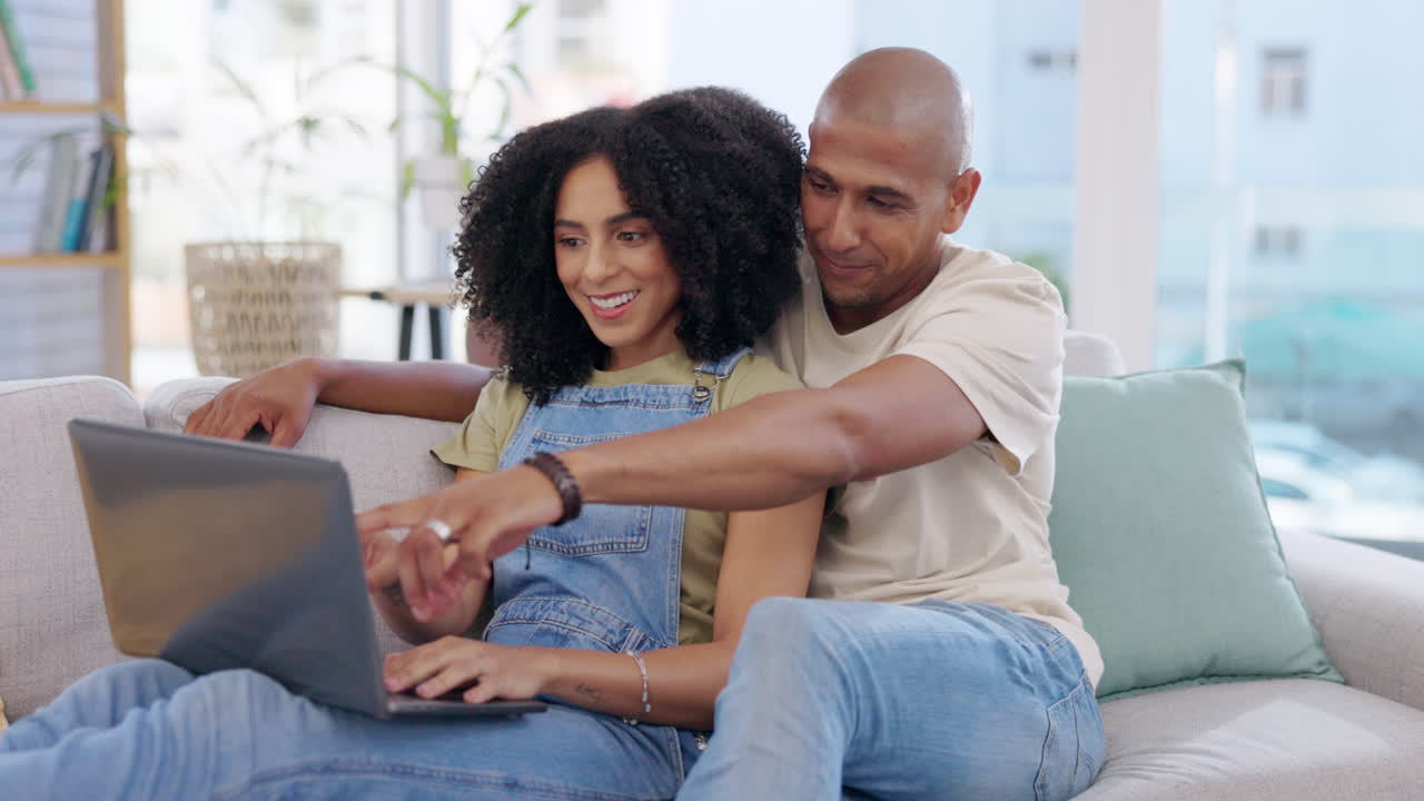 Laptop, couple and smile on sofa in home living