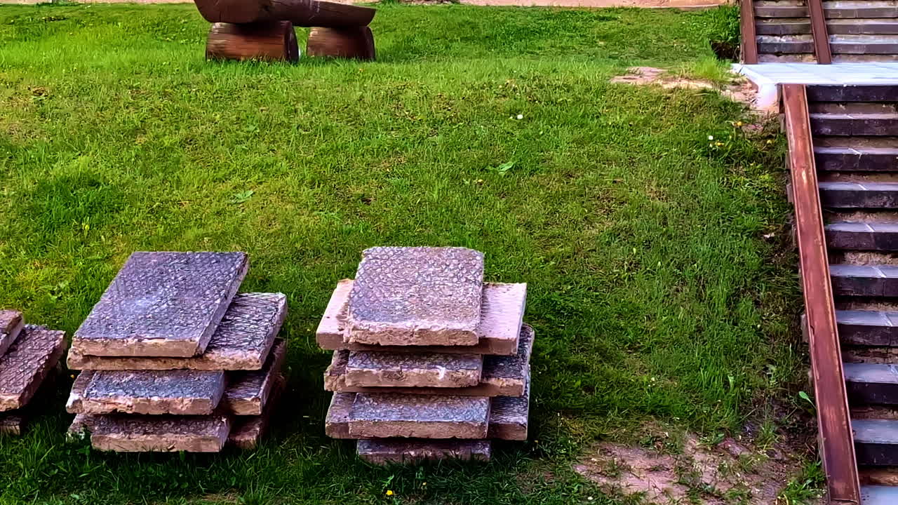 Stack Of Pavers, Paving Stones In The Garden. - closeup shot