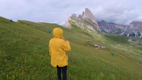 woman tourist on dolomites mountain range in italy - close up