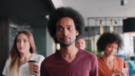 business people walking in the office corridor