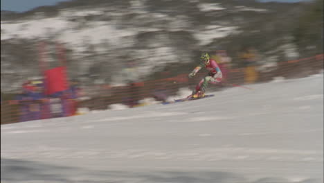 a skier navigates a down hill slalom course 2