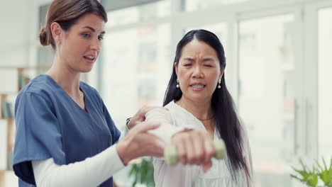 Woman-patient,-dumbbell-and-physiotherapy-of-nurse