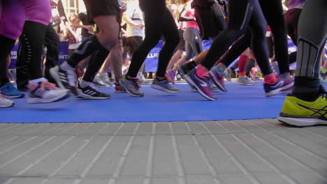 left to right traveling on montpellier marathon runners close to the ground