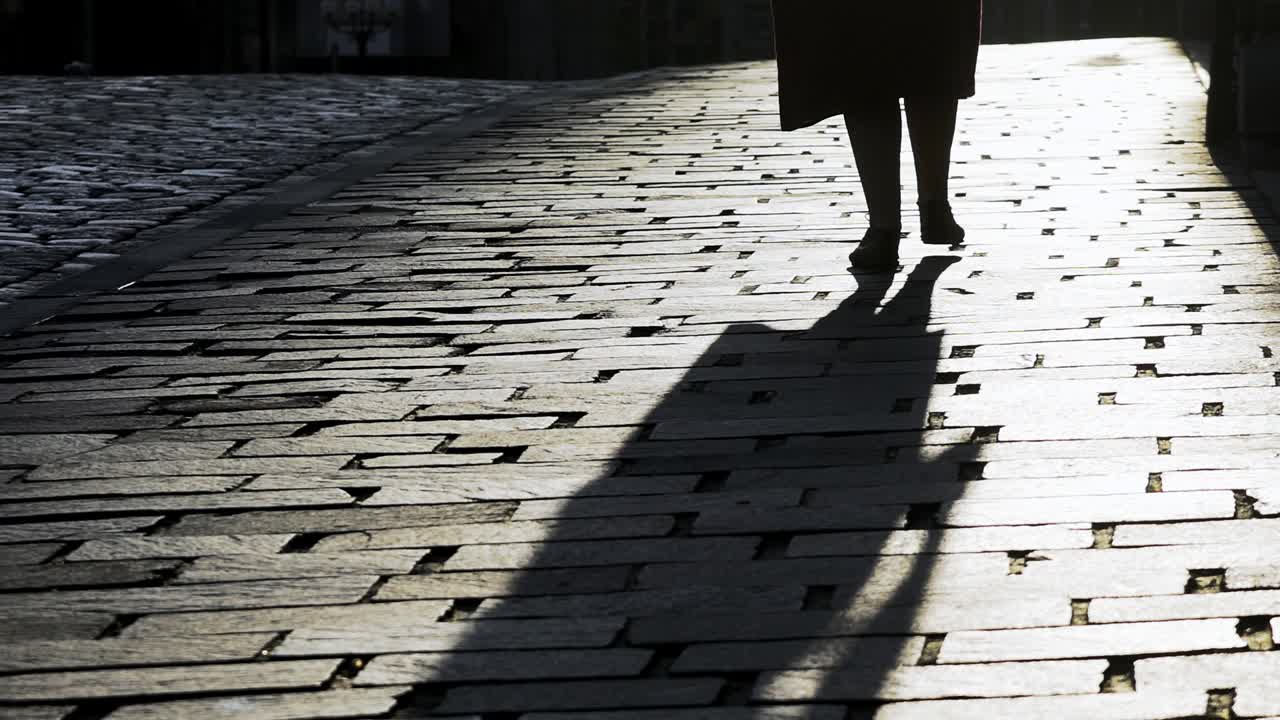 Girl playing with shadow.