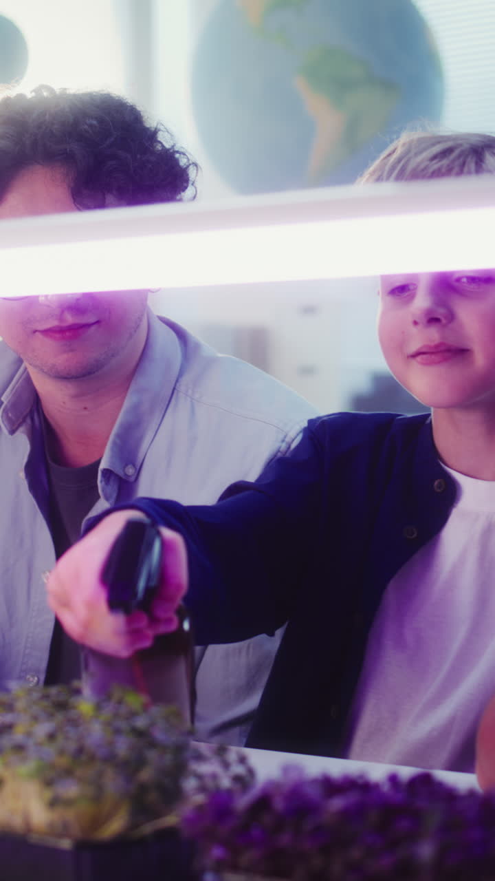Students in a science class, observing plants