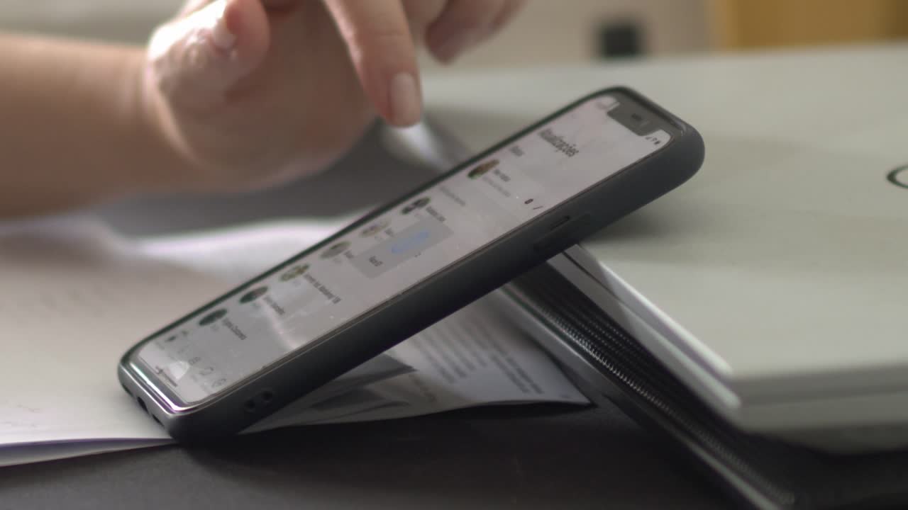 Woman using Instagram app on her smartphone