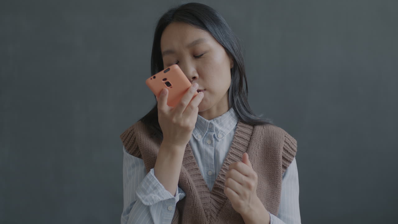 Woman using phone for selfie