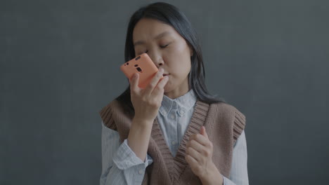 woman using phone for selfie
