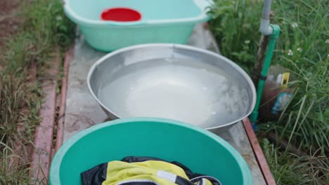 washing clothes outdoors