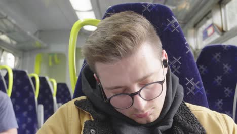 Been-a-busy-day-as-young-man-takes-time-to-nap-onboard-train-journey