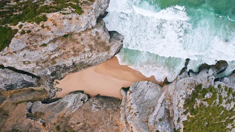 tropical beach aerial view, top view of breaking waves on tropical beach