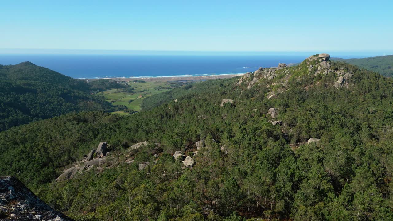 Pile Of Granite Rock At Penedos de Pasarela e Traba Nature Reserve In Spain. Aerial Drone Shot