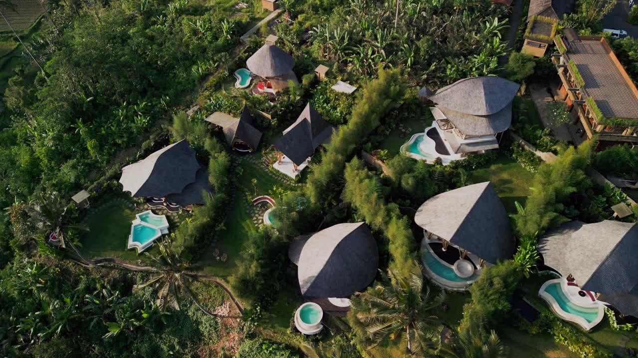 Escape to Bali bamboo villas featuring handcrafted bamboo architecture, tranquil valley outlook, luxury poolside comfort, and serene tropical landscapes designed for mindful travelers