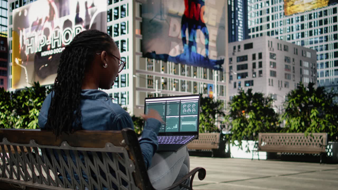 Business data charts, african american woman on bench, digital nomad