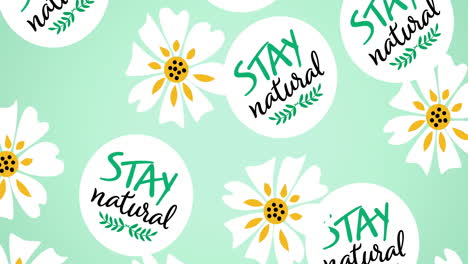 animation of multiple falling stay natural text and logos, and white flower heads on green