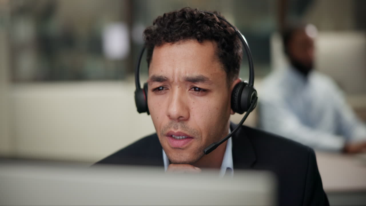 Man wearing headset in office
