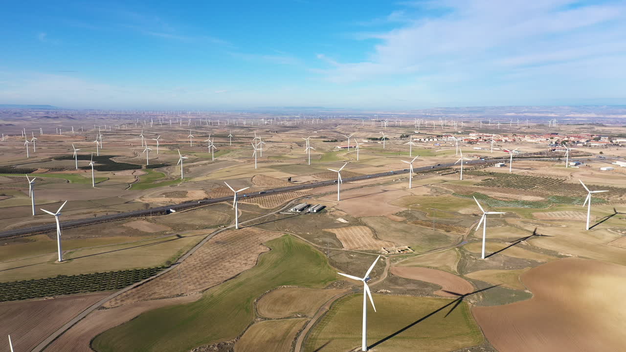 landscape with windfarm aerial shot Spain wind turbines green electricity sunny