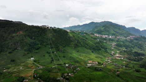 aerial over fansipan cable car ride cables spanning lush sapa muong hoa valley