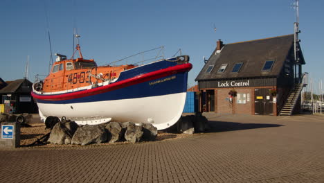 wide shot of an rnli lifeboat set in a roundabout at hythe marina