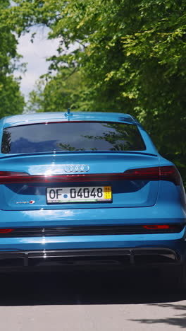 travel urban transport in motion. new modern car driving on the road. vertical video