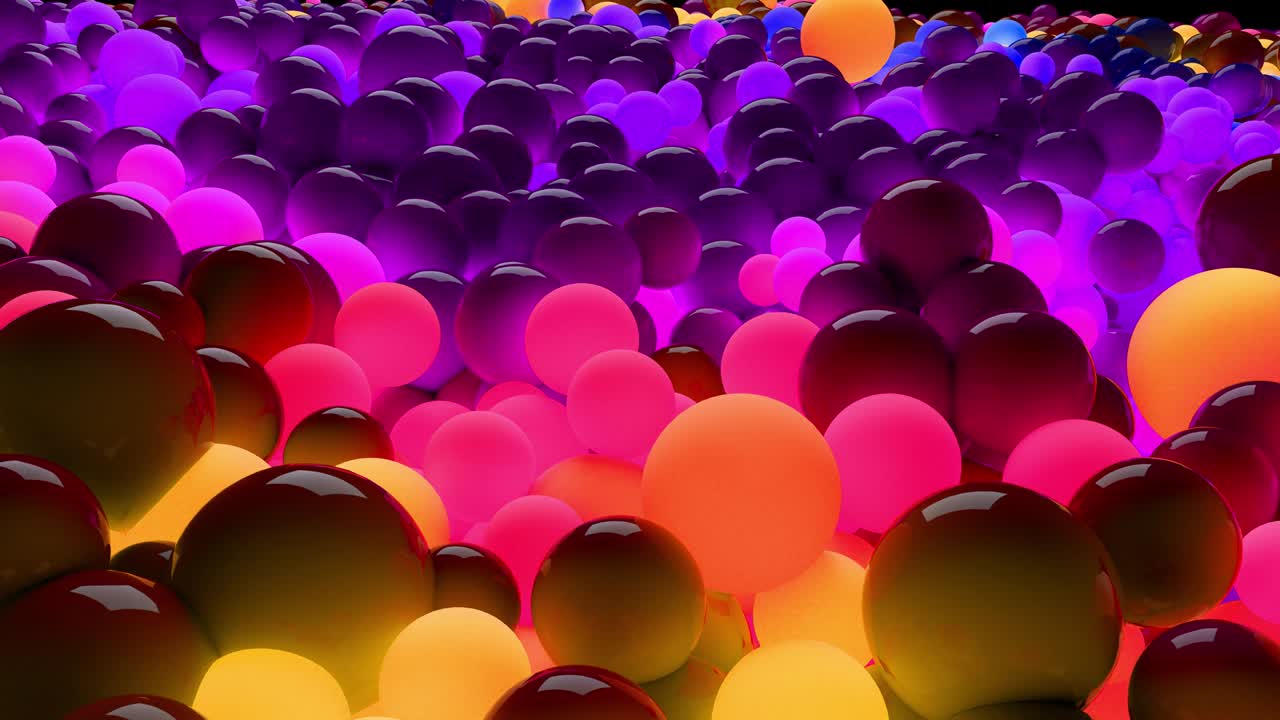 3D loop of animation in 4k with beautiful small and large spheres or balls as an abstract holiday background. Beautiful composition of colorful glowing spheres
