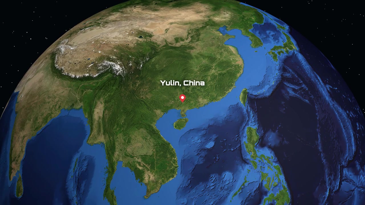 デジタル地球儀が宇宙から回転しながら中国の玉林にある特定の場所マーカーにズームする。
