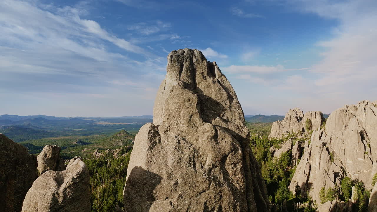 Breathtaking aerial footage of layered rock formations and canyons in the western United States.