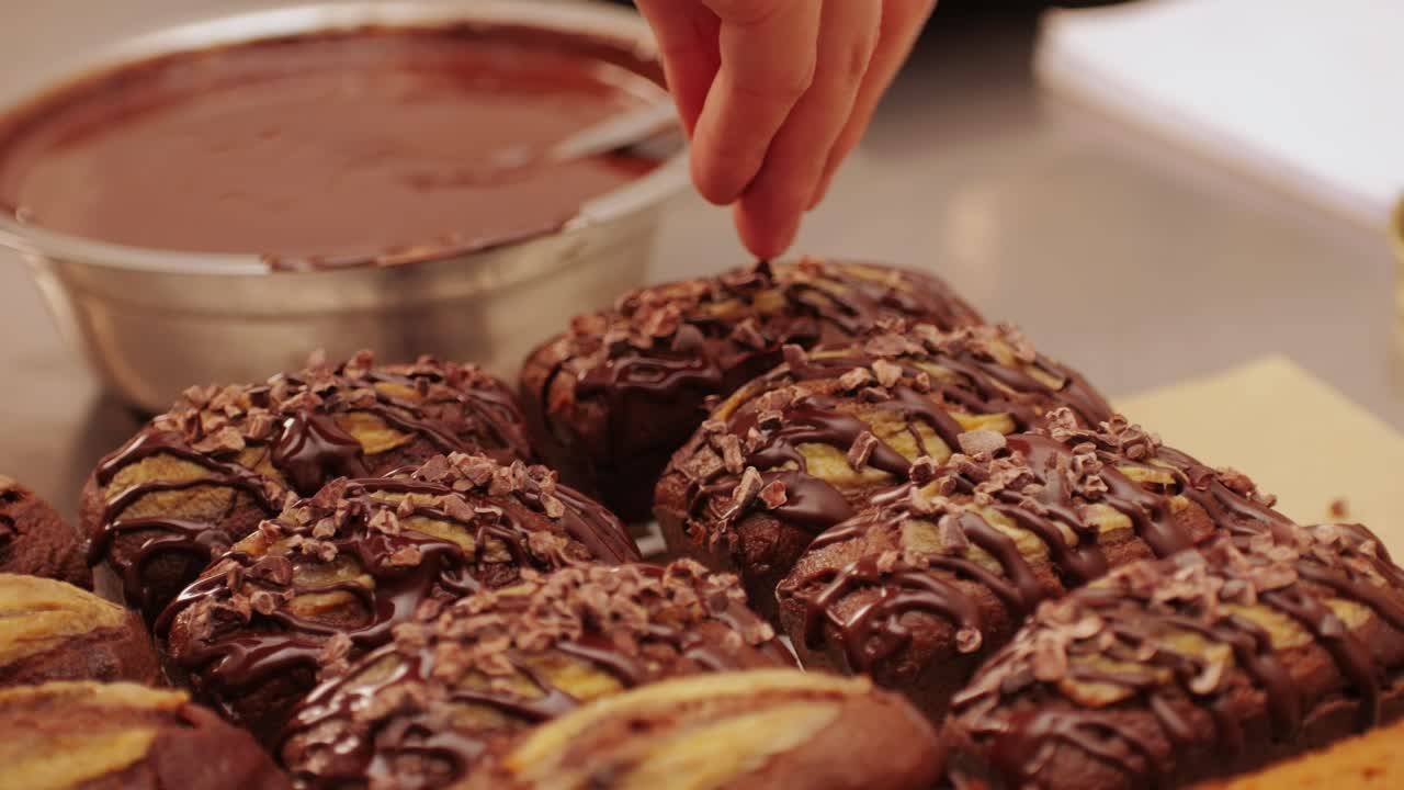 Fresh bake double chocolate banana artesian bread in bakery shop close-up. Artisan bread is making by skill bakers using natural and high-quality ingredients. Food with health and flavour benefits. Sweet breads for dessert and breakfast