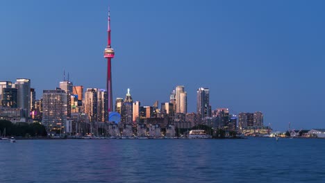 toronto, canada, day to night timelapse view of toronto skyline and lake ontario