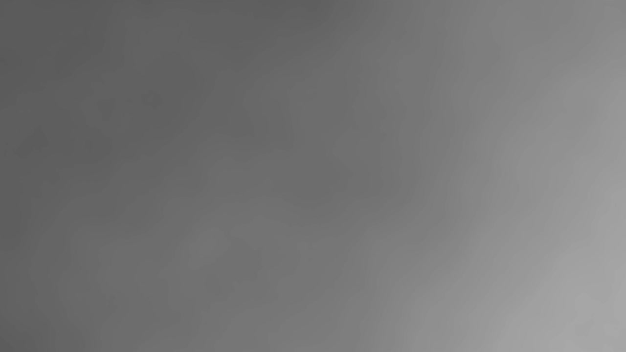 검은 바탕에 움직이는 흐릿한 안개 또는 연기의 애니메이션