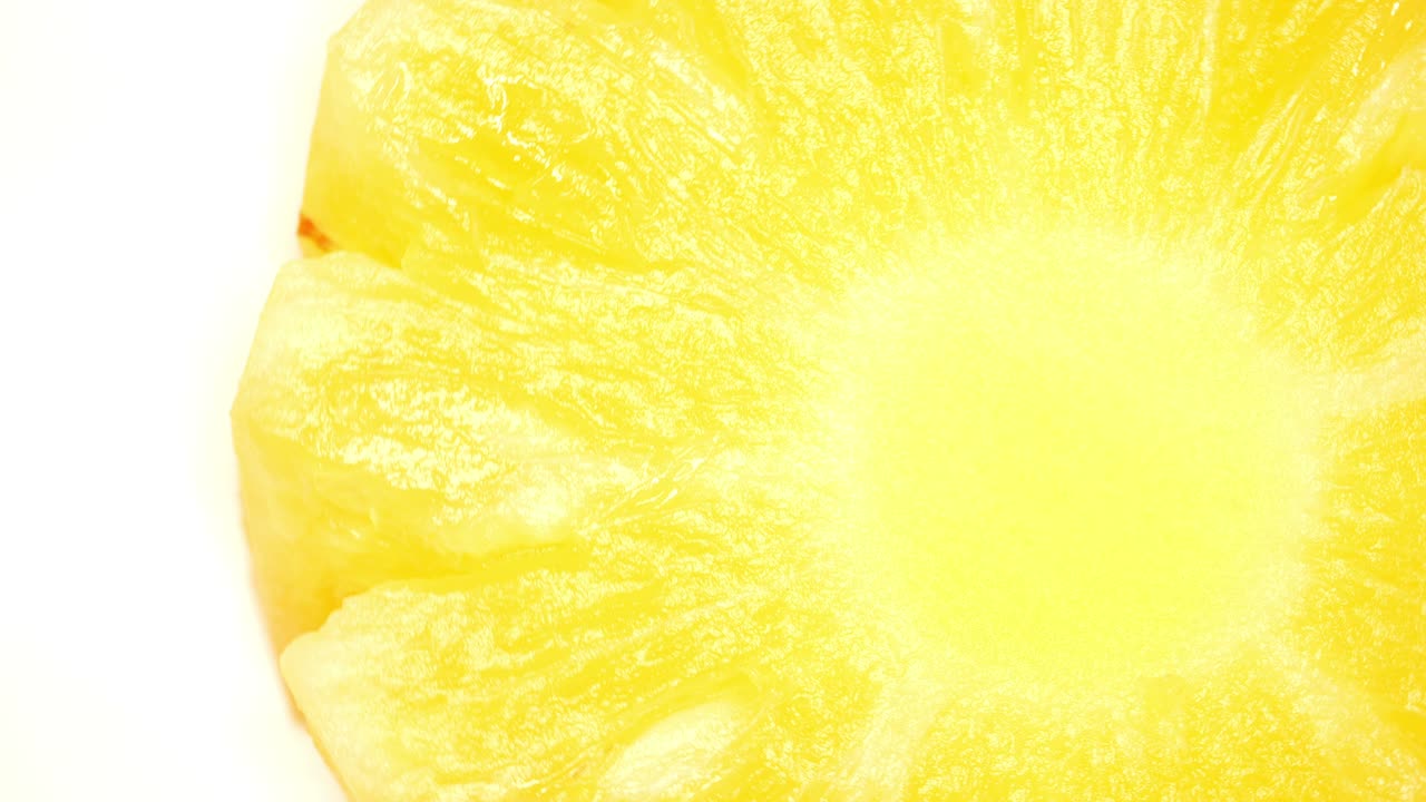 위쪽 보기 회전 슬라이스 신선한 파인애플 클로즈업, 노란 파인애폴 링 텍스처.