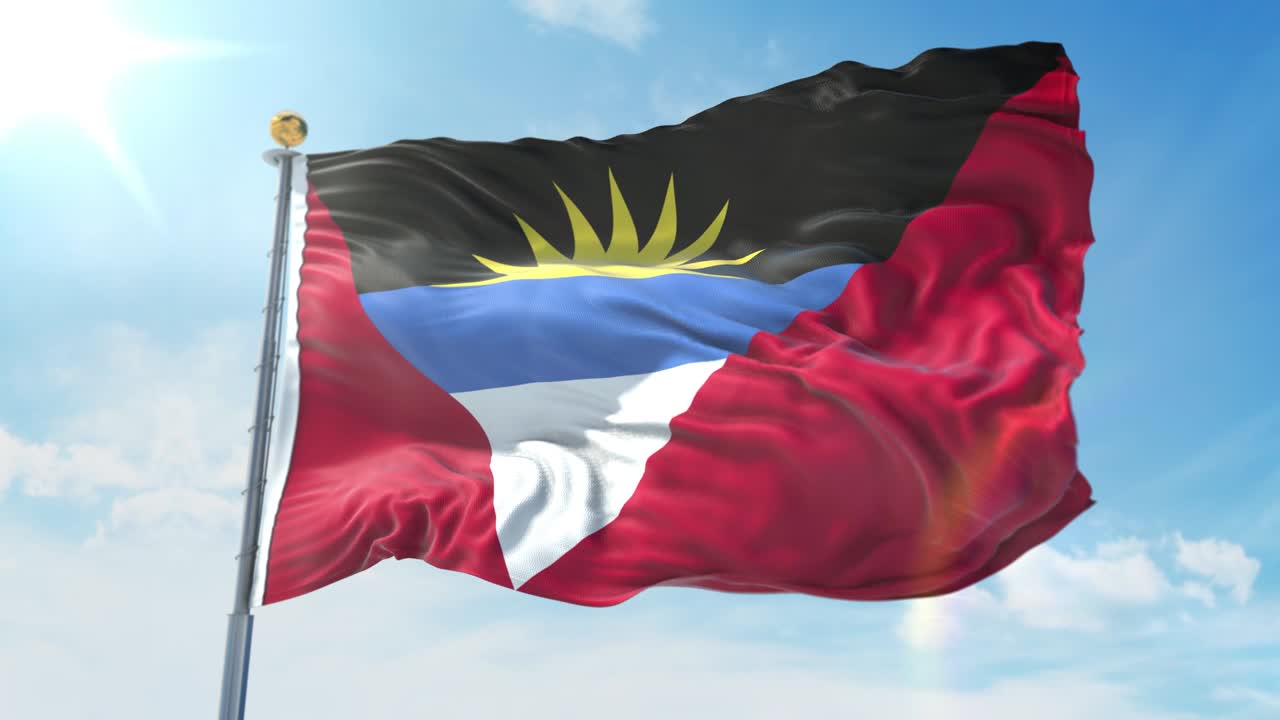 la bandera de antigua y barbuda ondeando en el viento contra el cielo azul profundo. tema nacional, concepto internacional. renderizado en 3d en bucle sin costuras 4k