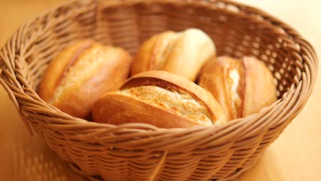 freshly baked rolls in wicker basket