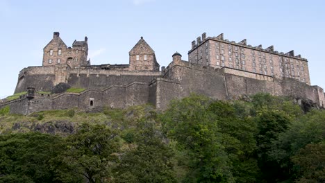 Looking-Up-Edinburgh-Castle-On-''Castle-Rock''-Seen-From-Old-Town-On-Sunny-Day