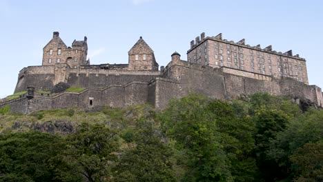 looking up edinburgh castle on ''castle rock'' seen from old town on sunny day