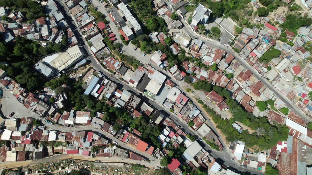 Colorful rooftops and a cemetery, guarenas, miranda, tilt up, daytime, aerial view