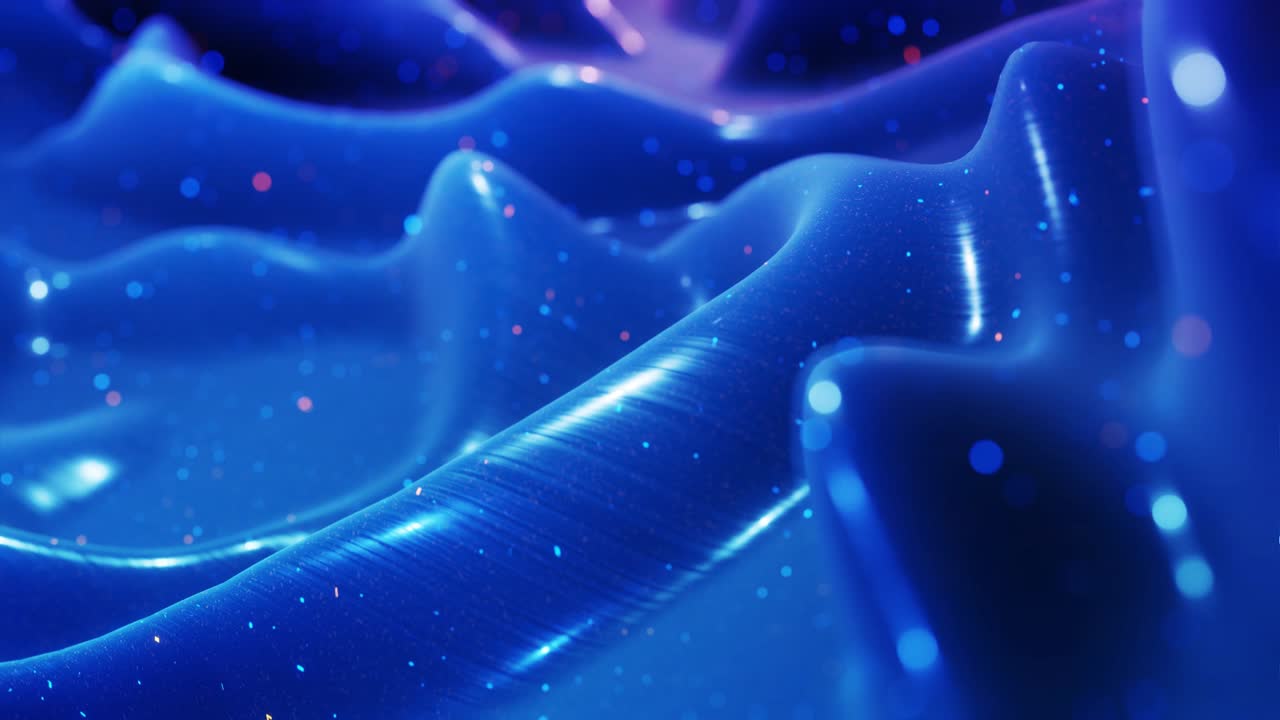 Stylish abstract blue surface as fantastical festive bg. Looped background, waves move on glossy surface like landscape made of liquid blue wax with sparkles. Beautiful soft bg with smooth animatin 4k