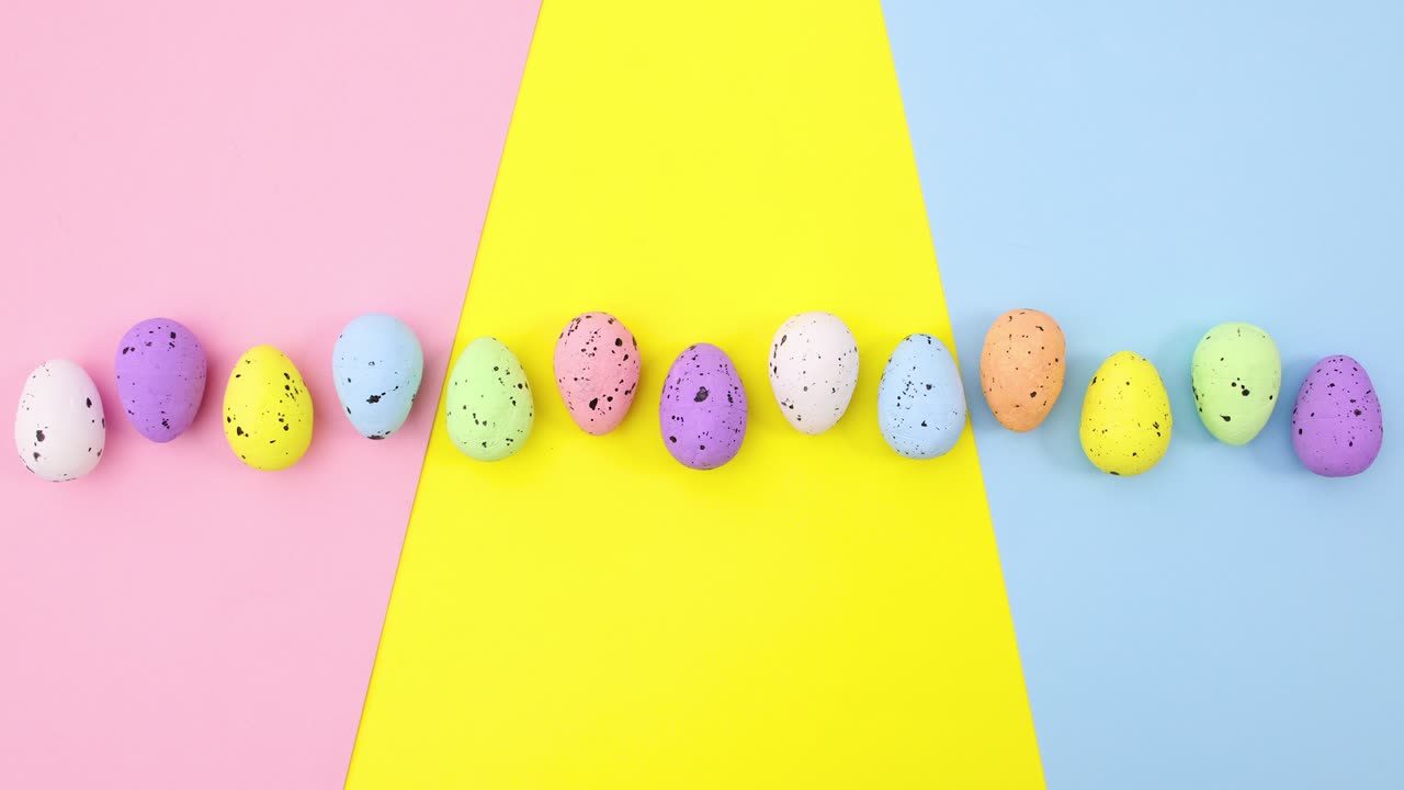 Colorful eggs for Easter appear and move on colorful theme. Stop motion