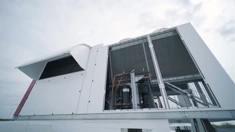 the air conditioning and ventilation system of a large industrial facility is located on the roof. it includes an air conditioner, smoke exhaust, and ventilation.