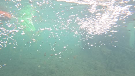 underwater kayaking with bubbles