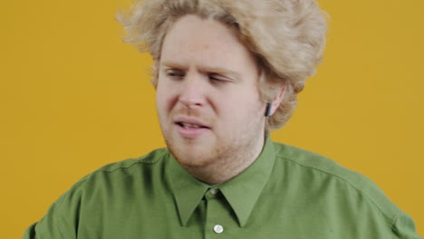 man dancing with wireless headphones