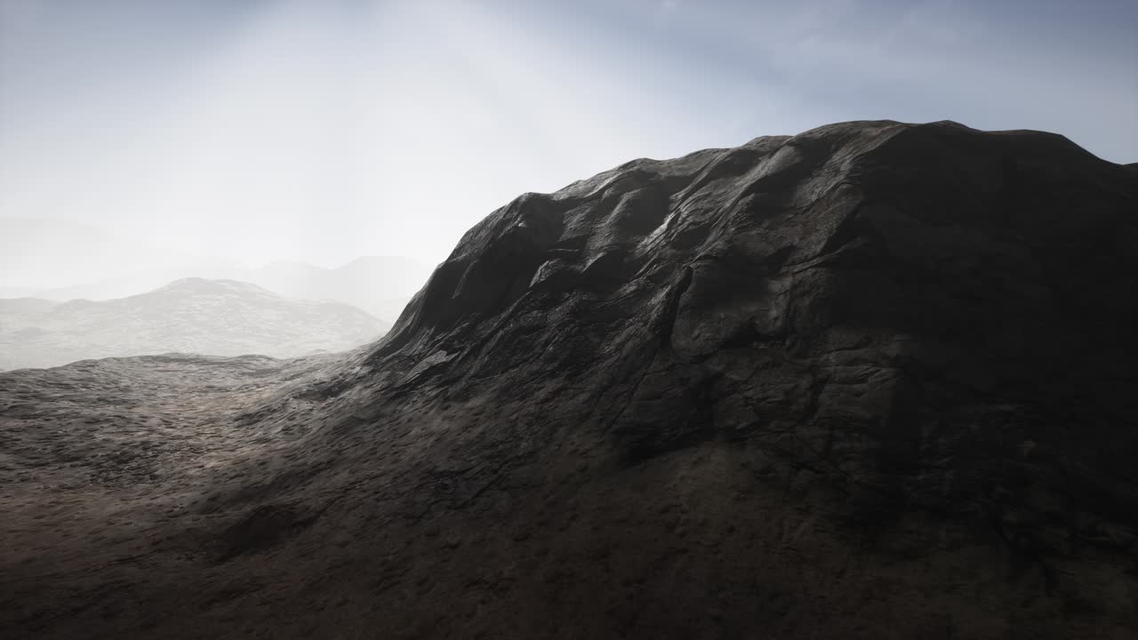 rayos de sol sobre las montañas en un valle