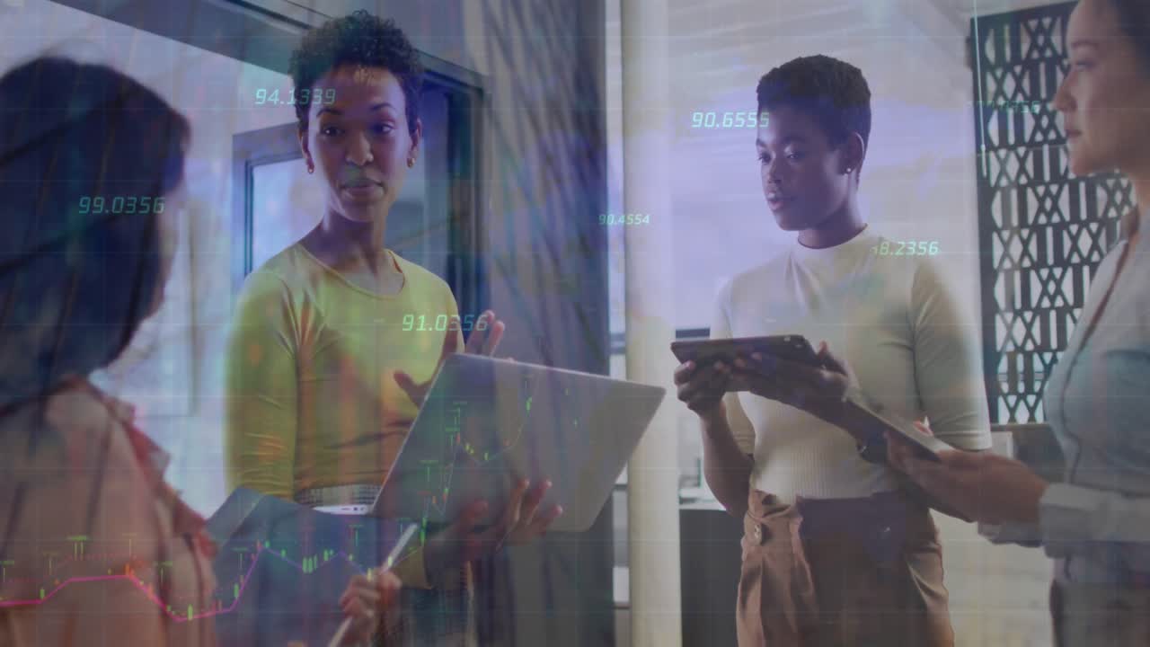 Animation of numbers over diverse female coworkers in office