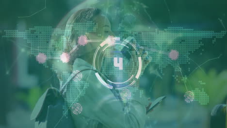 animation of globe with scope scanning and world map over biracial woman using smartphone