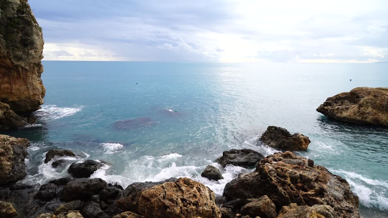 Waves crashing on a rocky coastline