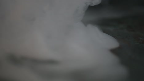 abstract close-up of smoke creeping across the surface