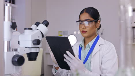 Tablet,-research-and-science-woman-in-laboratory