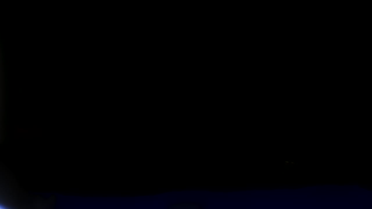 Beautiful, stunning light reflections and anamorphic blue streaks shot on black with high-end cinema anamorphic lens as a background, light leak overlays or transitions for editors